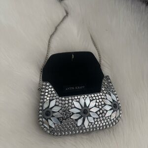 Antik Kraft Silver Clutch with Floral Embellishments